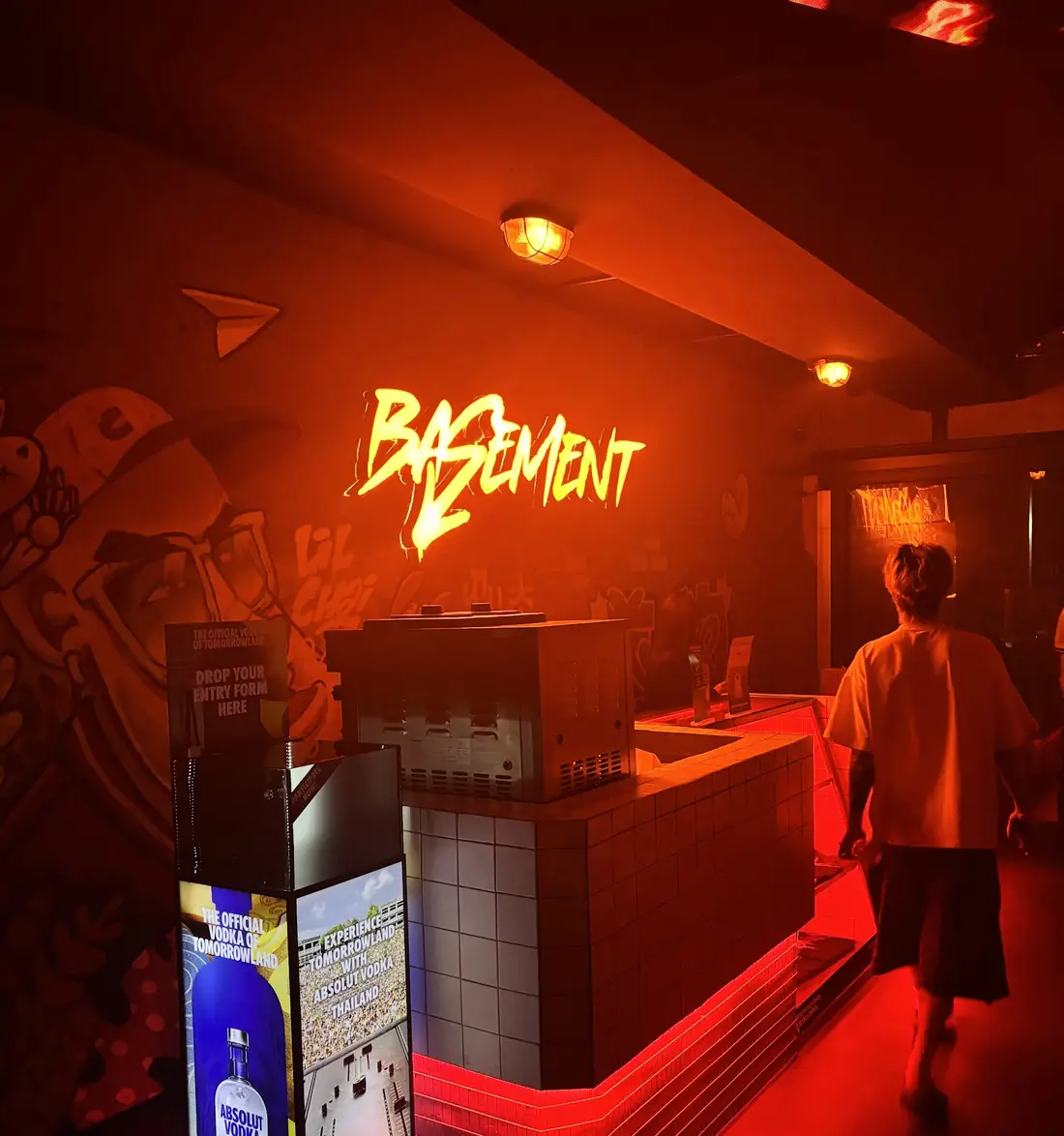 Basement KL neon sign over the graffiti bar